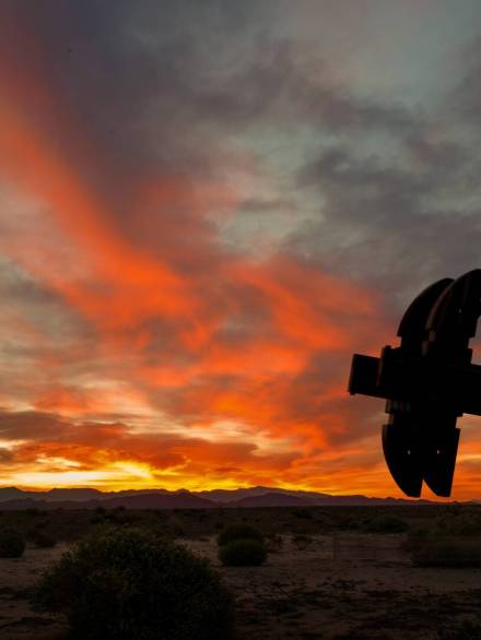 Silhouette,Of,Oil,Pump,In,Desert,Landscape,At,Sunset.,Space